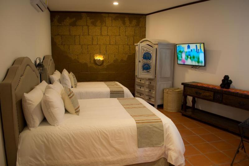 Casa De Adobe Gallery & Luxury Boutique Oaxaca Номер фото