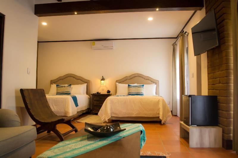 Casa De Adobe Gallery & Luxury Boutique Oaxaca Номер фото